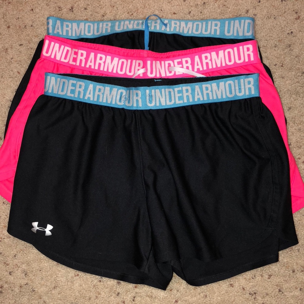 3 pairs of under armour athletic shorts.